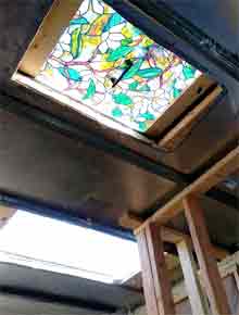Stained glass skylight in box truck roof.